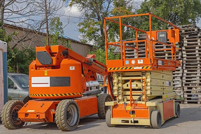 forklift operator organizing inventory in warehouse in Burtonsville